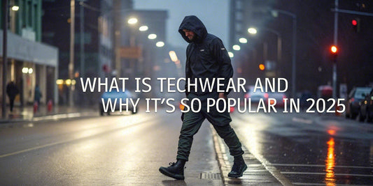 Man wearing full techwear outfit walking through rainy city street at night in 2025 with blog title overlay