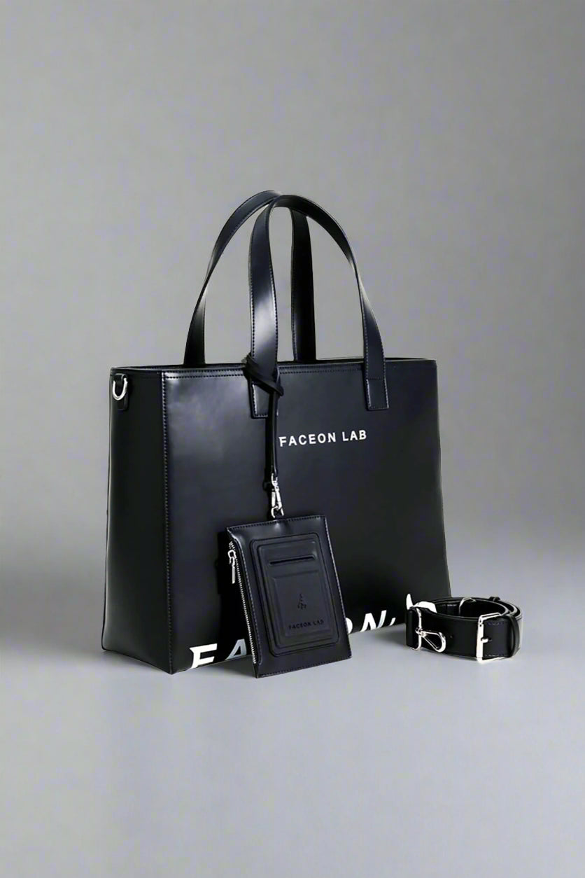 Black handbag with matching pouch and dog collar on a white background, featuring the 'FACEON LAB' brand.