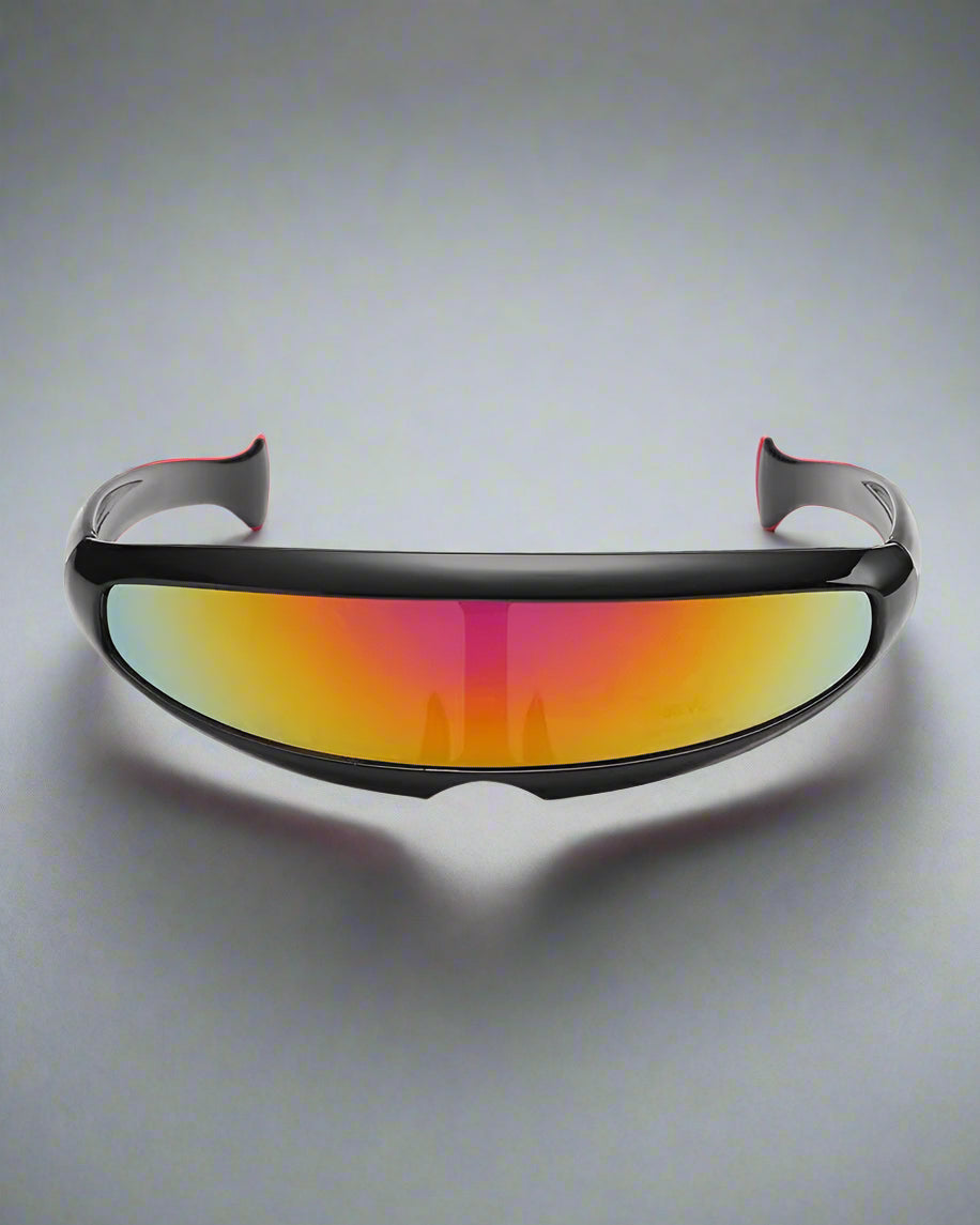 A pair of black and multicolored performance vision goggles with a sleek design.